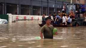 Severe Flooding in China Has Commuters Deep in Water on Subway